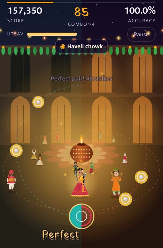 Striking sticks with a dandiya partner in the haveli chowk